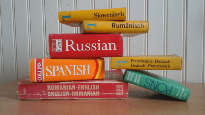 Pile of dictionaries for website translation